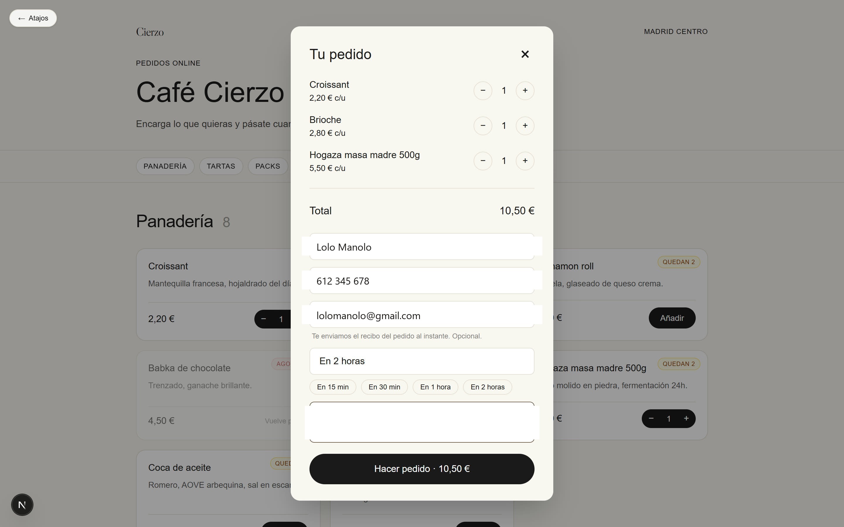 Cart modal abierto con productos, total y formulario de pedido